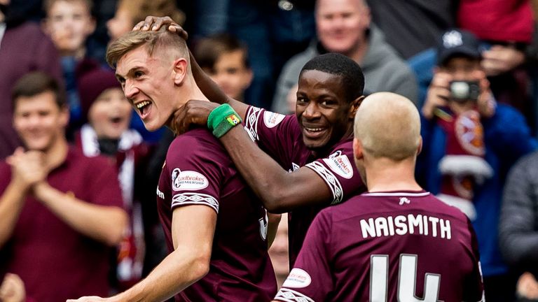 Hearts Jimmy Dunne (L) celebrates scoring his side's second goal against St Johnstone