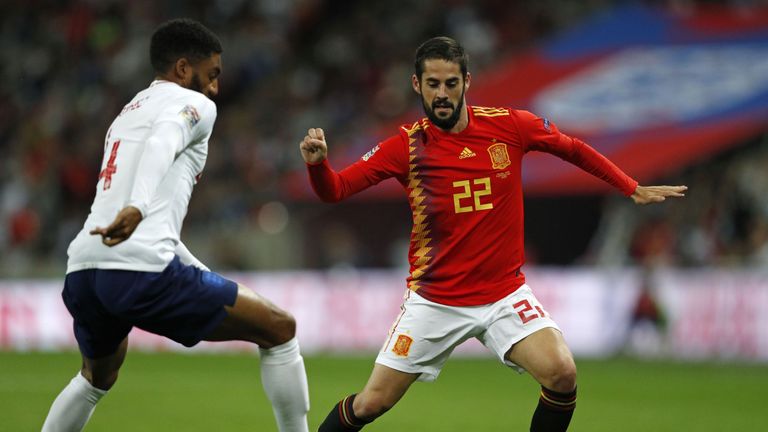 Joe Gomez and Isco battle at Wembley