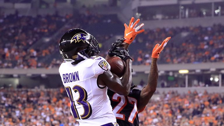 John Brown elevates above Dre Kirkpatrick to score for the Ravens