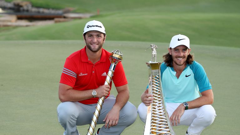 DUBAI, UNITED ARAB EMIRATES - NOVEMBER 19:  Jon Rahm of Spain (L) poses with the DP World Tour Championship trophy and Tommy Fleetwood of England poses with the Race to Dubai trophy after the final round of the 2017 DP World Tour Championship on the Earth Course at Jumeirah Golf Estates on November 19, 2017 in Dubai, United Arab Emirates.  (Photo by David Cannon/Getty Images)