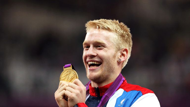 Gold medalist Jonnie Peacock of Great Britain poses on the podium during the victory ceremony for the Men&#39;s 100m - T44 on day 8 of the London 2012 Paralympic Games at Olympic Stadium on September 6, 2012 in London, England.