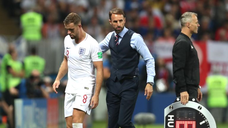 Gareth Southgate, Manager of England congratulates Jordan Henderson of England after his substitution during the 2018 FIFA World Cup Russia Semi Final match between England and Croatia at Luzhniki Stadium on July 11, 2018 in Moscow, Russia.