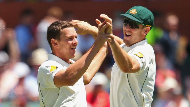 ADELAIDE, AUSTRALIA - NOVEMBER 29:  Josh Hazlewood of Australia is congratulated by Mitch Marsh after getting the wicket of BJ Watling of New Zealand  during day three of the Third Test match between Australia and New Zealand at Adelaide Oval on November 29, 2015 in Adelaide, Australia.  (Photo by Quinn Rooney/Getty Images)