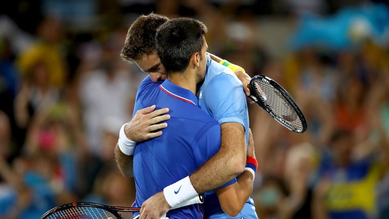 Juan Martin Del Potro of Argentina is congratulated by Novak Djokovic of Serbia after his victory in their singles match on Day 2 of the Rio 2016 Olympic Games at the Olympic Tennis Centre on August 7, 2016 in Rio de Janeiro, Brazil. 