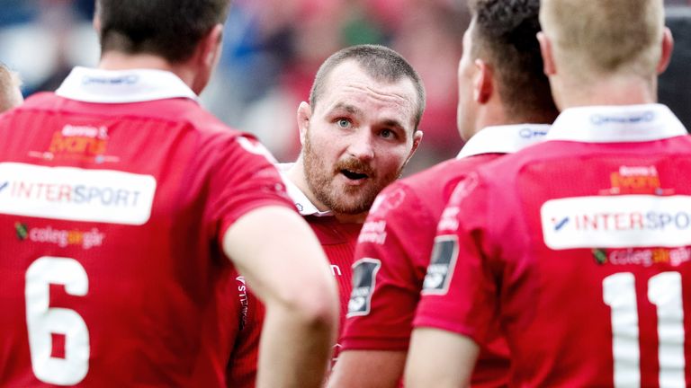 Ken Owens of Scarlets speaks to his players