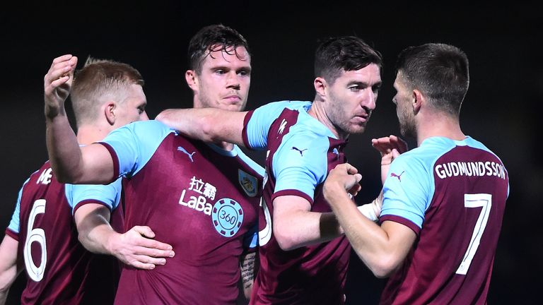 Kevin Long of Burnley celebrates with teammates after scoring his team's first goal during the Carabao Cup Third Round match between Burton Albion and Burnley at Pirelli Stadium on September 25, 2018 in Burton-upon-Trent, England.  (Photo by Nathan Stirk/Getty Images)