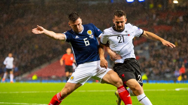 Scotland's Kieran Tierney holds off Albania's Enis Gavazaj