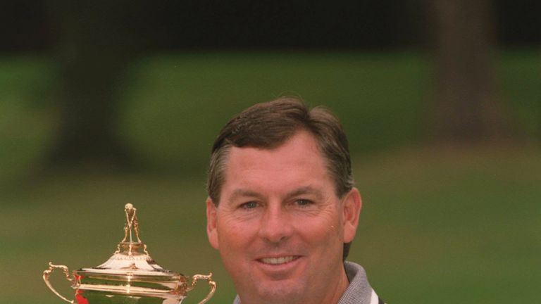 Lanny Wadkins holds the Ryder Cup trophy in 1995