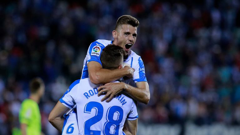 LEGANES, SPAIN - SEPTEMBER 26: Gerard Gumbau (R) Deportivo Leganes celebrates their victory with teammate Rodrigo Tarin (R) after the La Liga match between CD Leganes and FC Barcelona at Estadio Municipal de Butarque on September 26, 2018 in Leganes, Spain. (Photo by Gonzalo Arroyo Moreno/Getty Images)