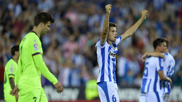 Leganes' Spanish midfielder Gerard Gumbau celebrates their win at the end of the Spanish league football match Club Deportivo Leganes SAD against FC Barcelona at the Estadio Municipal Butarque in Leganes on the outskirts of Madrid on September 26, 2018. (Photo by OSCAR DEL POZO / AFP)        (Photo credit should read OSCAR DEL POZO/AFP/Getty Images)