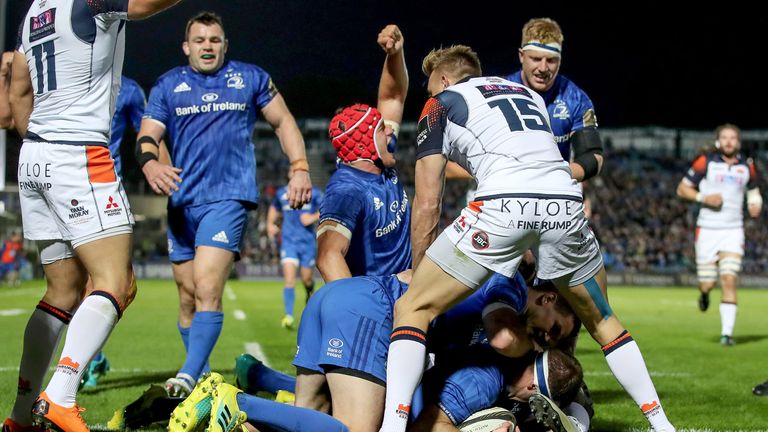 Josh van der Flier celebrates as Fergus McFadden goes over for the opening try 