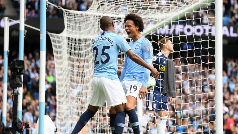 Leroy Sane celebrates scoring Manchester City&#39;s first goal against Fulham