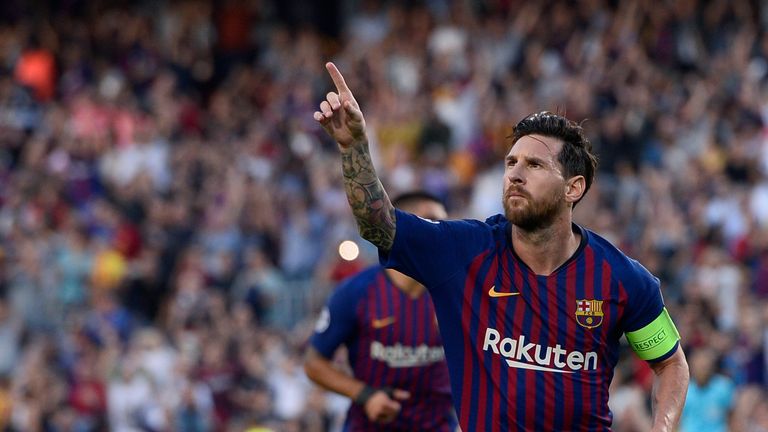 Barcelona's Argentinian forward Lionel Messi celebrates after scoring during the UEFA Champions' League group B football match FC Barcelona against PSV Eindhoven at the Camp Nou stadium in Barcelona on September 18, 2018