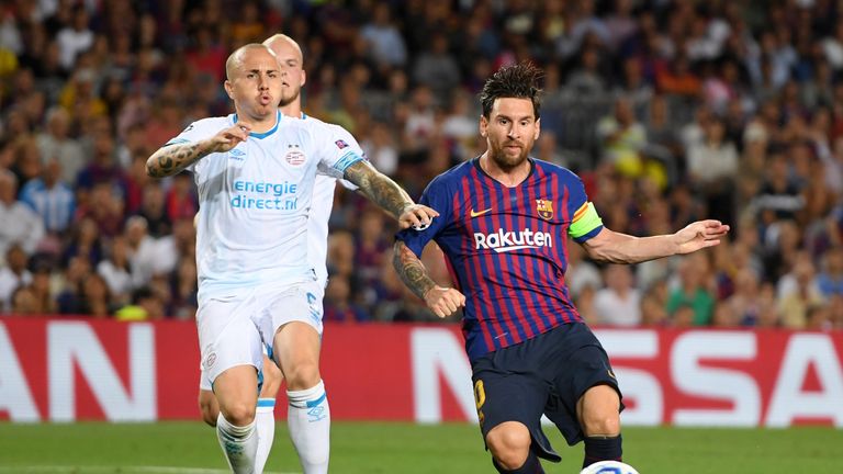 Lionel Messi scores his third goal during the Group B match of the UEFA Champions League between FC Barcelona and PSV at Camp Nou on September 18, 2018 in Barcelona, Spain.