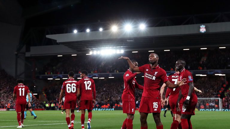 Daniel Sturridge of Liverpool celebrates after scoring his team's first goal during the Group C match of the UEFA Champions League between Liverpool and Paris Saint-Germain at Anfield on September 18, 2018 in Liverpool, United Kingdom