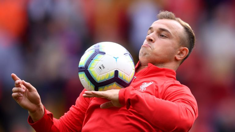 Xherden Shaqiri warms up ahead of the Premier League match between Liverpool FC and West Ham United at Anfield on August 12, 2018 in Liverpool, United Kingdom.
