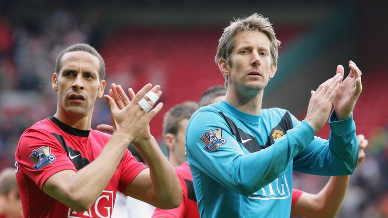 MANCHESTER, ENGLAND - MAY 9:  Rio Ferdinand and Edwin van der Sar of Manchester United appluad the fans on the lap of honour after the Barclays Premier League match between Manchester United and Stoke City at Old Trafford on May 9 2010 in Manchester, England. (Photo by Tom Purslow/Manchester United via Getty Images) *** Local Caption *** Rio Ferdinand;Edwin van der Sar
