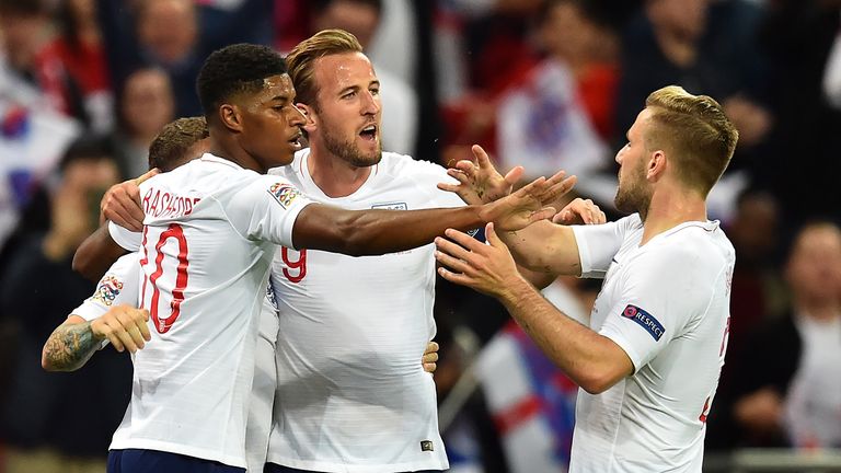 England's striker Marcus Rashford (2nd L) celebrates with teammates after scoring the opening goal of the UEFA Nations League football match between England and Spain at Wembley Stadium in London on September 8, 2018.