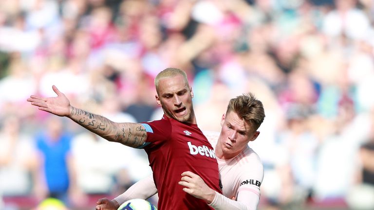 Marko Arnautovic and Scott McTominay battle for the ball