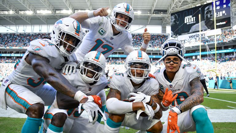 MIAMI, FL - SEPTEMBER 23: The Miami Dolphins celebrate after scoring a touchdown during the fourth quarter against the Oakland Raiders at Hard Rock Stadium on September 23, 2018 in Miami, Florida. (Photo by Mark Brown/Getty Images) *** Local Caption *** Ryan Tannehill; Senorise Perry; Kenny Stills; Albert Wilson; Jakeem Grant