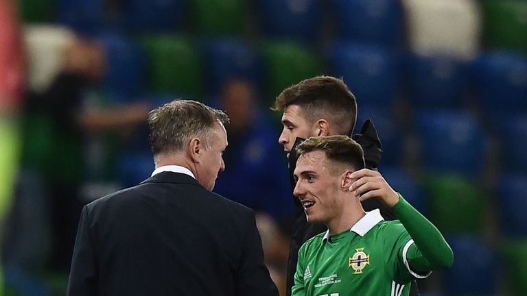 Northern Ireland manager Michael O'Neill congratulates goalscorer Gavin Whyte during the international friendly football match between Northern Ireland and Israel