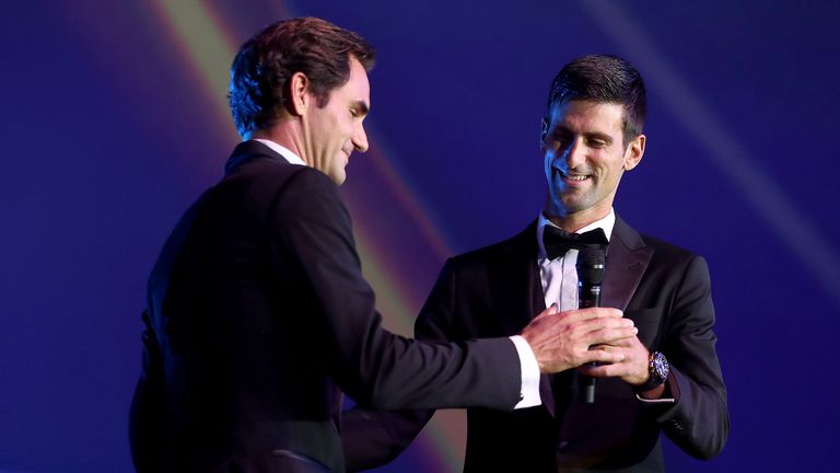 Team Europe Roger Federer of Switzerland hugs Team Europe Novak Djokovic of Serbia on stage during the Laver Cup Gala at the Navy Pier Ballroom on September 20, 2018 in Chicago, Illinois. The Laver Cup consists of six players from Team World competing against their counterparts from Team Europe. John McEnroe will captain Team World and Team Europe will be captained by Bjorn Borg. 