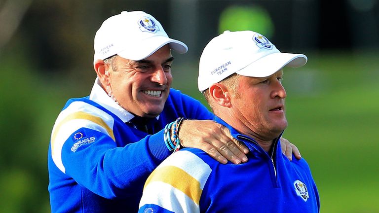 AUCHTERARDER, SCOTLAND - SEPTEMBER 28:  Jamie Donaldson of Europe is congratulated by Europe team captain Paul McGinley on the 15th hole shortly before Europe won the Ryder Cup after Donaldson defeated Keegan Bradley of the United States during the Singles Matches of the 2014 Ryder Cup on the PGA Centenary course at the Gleneagles Hotel on September 28, 2014 in Auchterarder, Scotland.  (Photo by David Cannon/Getty Images)