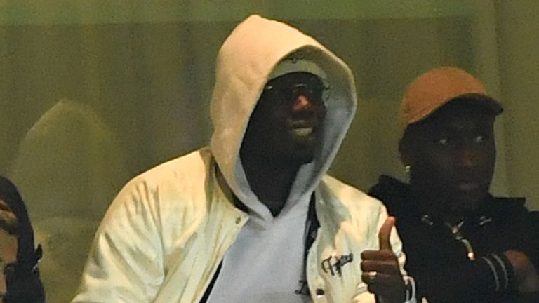 Paul Pogba of Manchester United looks on from the stands during the Carabao Cup Third Round match between Manchester United and Derby County at Old Trafford on September 25, 2018 in Manchester, England