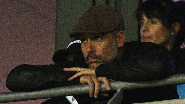 Manchester City's Spanish manager Pep Guardiola looks on from the stands during the UEFA Champions League group F football match between Manchester City and Lyon at the Etihad Stadium in Manchester, north west England, on September 19, 2018.