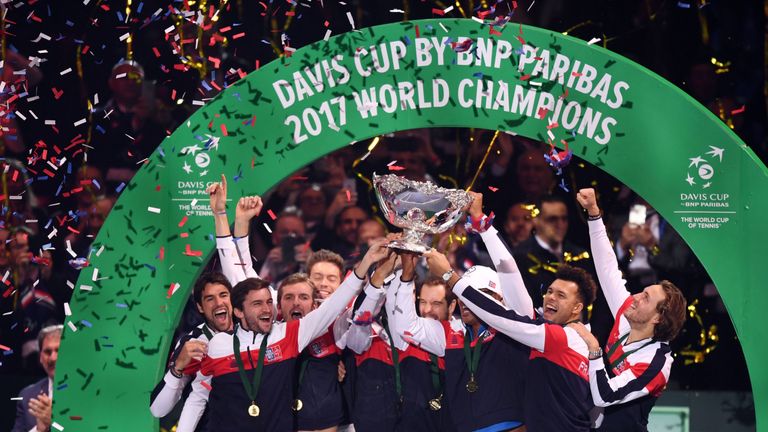 France's team hold the trophy after winning the Davis Cup World Group final tennis match between France and Belgium at The Pierre Mauroy Stadium in Villeneuve d'Ascq near Lille on November 26, 2017.