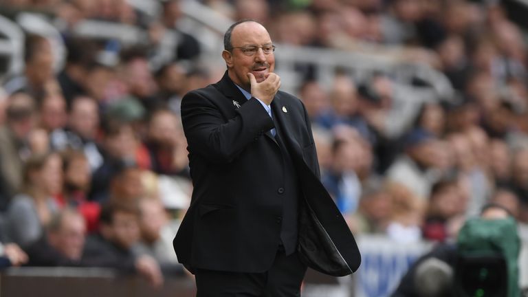 Rafa Benitez on touchline scratching his chin thoughtfully