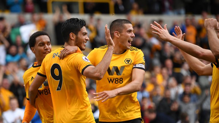 Raul Jimenez celebrates scoring with his Wolves team-mates after scoring against Burnley