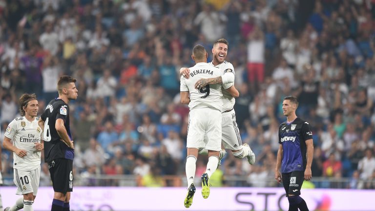 Karim Benzema celebrates with Sergio Ramos after scoring Real Madrid's second goal against Leganes