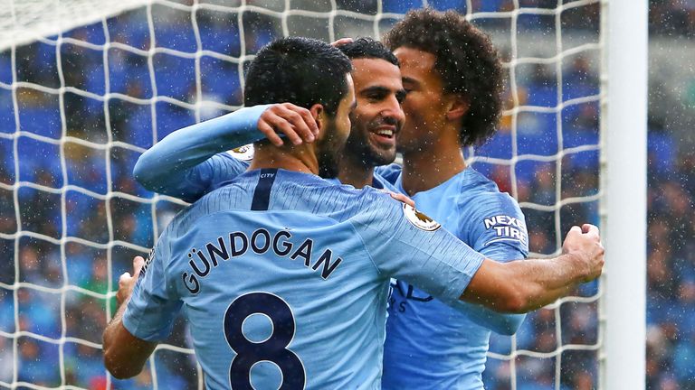 Riyad Mahrez celebrates his first goal Ilkay Gundogan and Leroy Sane