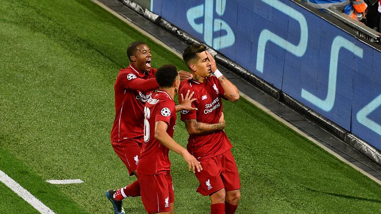 Roberto Firmino celebrates by covering one eye after scoring Liverpool's injury-time winner against Paris Saint-Germain at Anfield