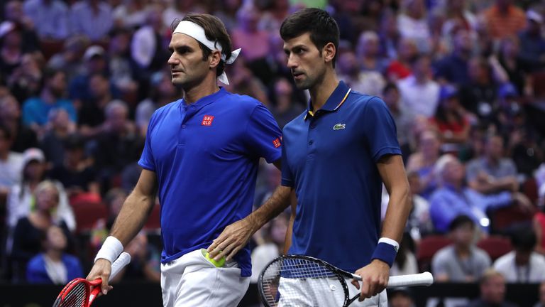 Team Europe Roger Federer of Switzerland and Team Europe Novak Djokovic of Serbia react against Team World Jack Sock of the United States and Team World Kevin Anderson of South Africa during their Men's Doubles match on day one of the 2018 Laver Cup at the United Center on September 21, 2018 in Chicago, Illinois. 