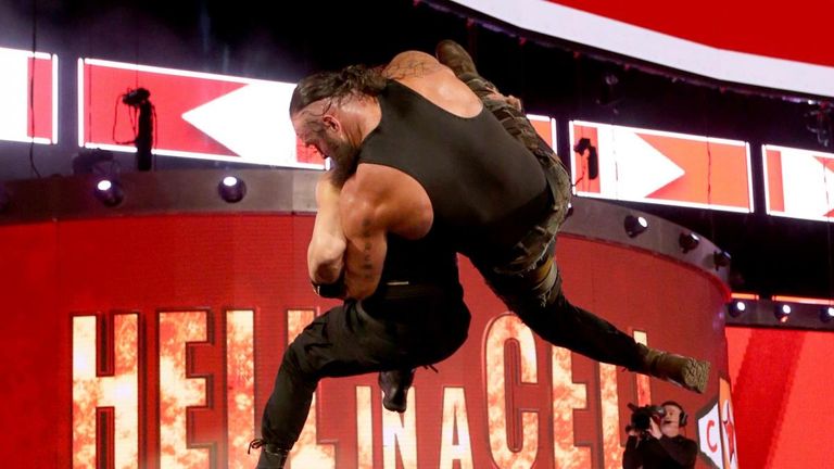 Last night's confrontation between Roman Reigns and Braun Strowman ended with a Samoan Drop off the commentary desk and through the stage