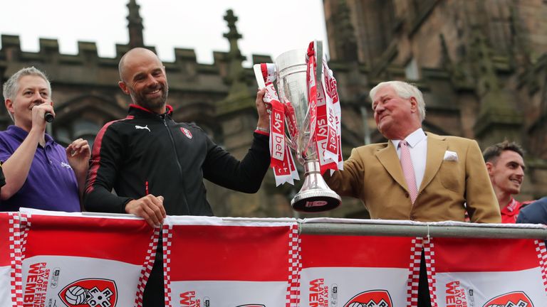 Rotherham United manager Paul Warne and Chairman Tony Stewart with the trophy during the League One promotion parade in Rotherham. PRESS ASSOCIATION Photo. Picture date: Tuesday May 29, 2018. See PA story SOCCER Rotherham. Photo credit should read: Richard Sellers/PA Wire