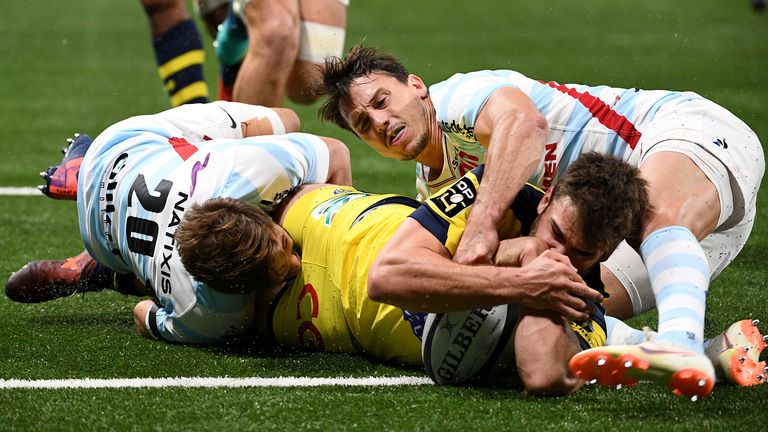 Clermont Auvergne's Damian Penaud crosses for a try against Top 14 rivals Racing 92