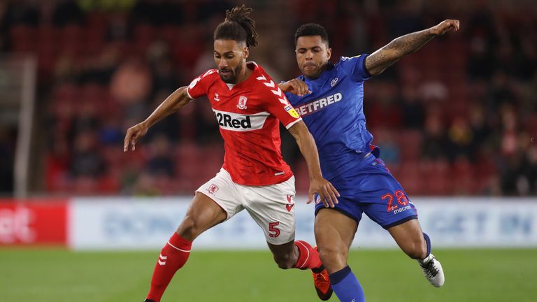 Middlesbrough's Ryan Shotton (left) and Bolton Wanderers' Josh Magennis battle for the ball during the Sky Bet Championship match at the Riverside Stadium, Middlesbrough.