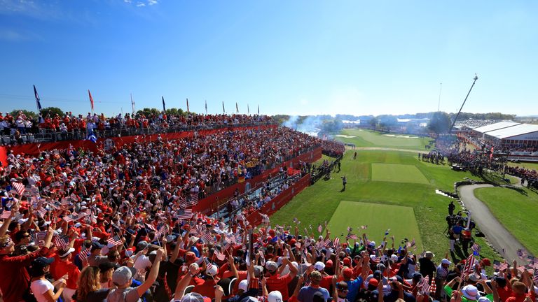 The crowd cheers on the first tee during singles matches of the 2016 Ryder Cup at Hazeltine National Golf Club on October 2, 2016 in Chaska, Minnesota. 