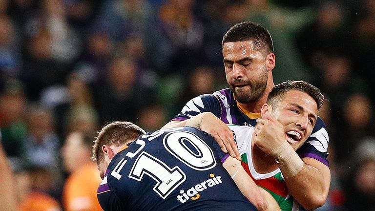 Sam Burgess of the Rabbitohs is tackled during the NRL Qualifying Final match between the Melbourne Storm and the South Sydney Rabbitohs 