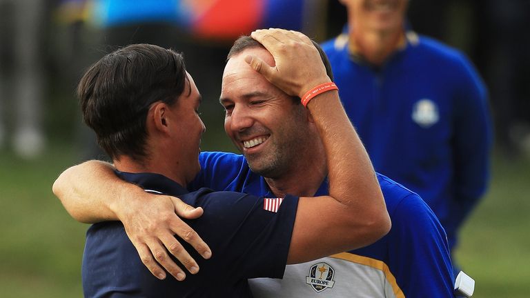 Fowler congratulated Garcia on the 17th green 