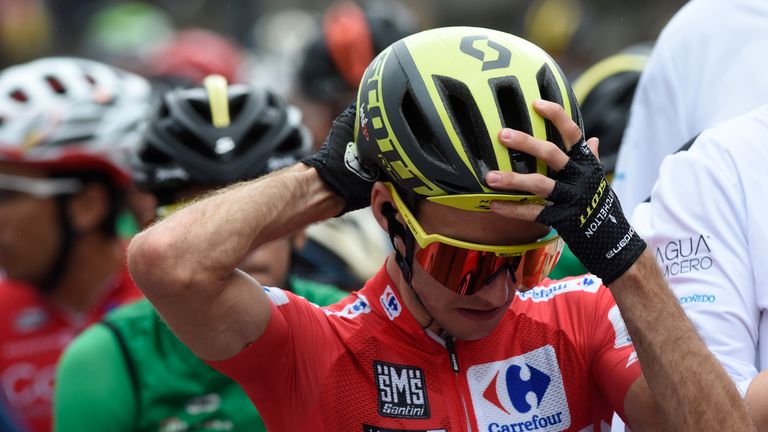 Mitchelton Scott's Simon Yates adjusts his helmet as he waits for the start of the 12th stage of the 73rd edition of 'La Vuelta' Tour of Spain on September 6, 2018