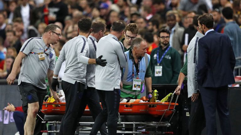 Southgate looks on as Luke Shaw is stretchered from the field