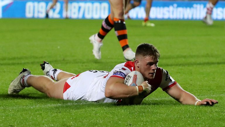 Morgan Knowles of St Helens scores a try 