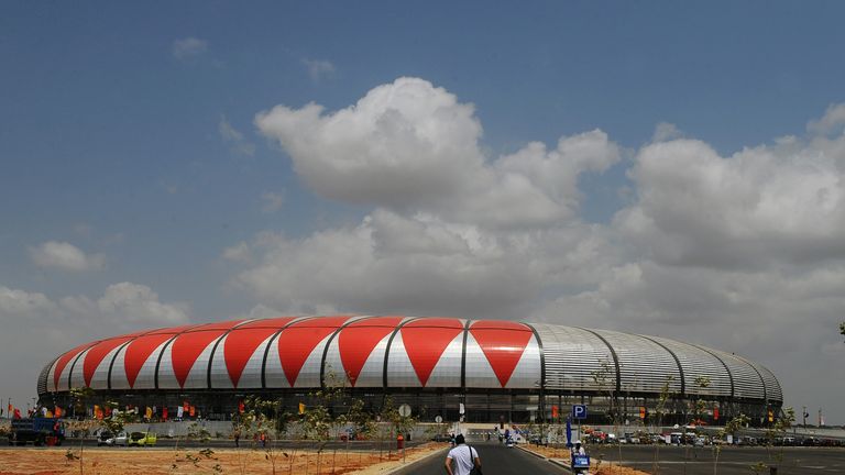 A journalist arrives to watch a match of the African Cup of Nations football championships CAN2010 between Algeria and Malawi at November 11 stadium in Luanda on January 11, 2010