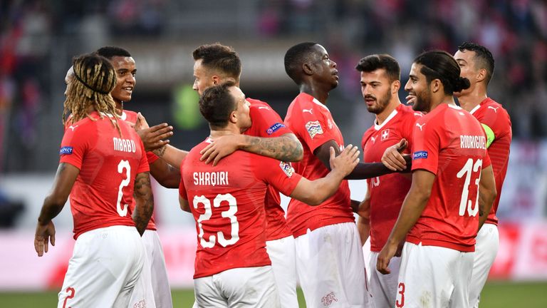 Switzerland players celebrate during their 6-0 win over Iceland
