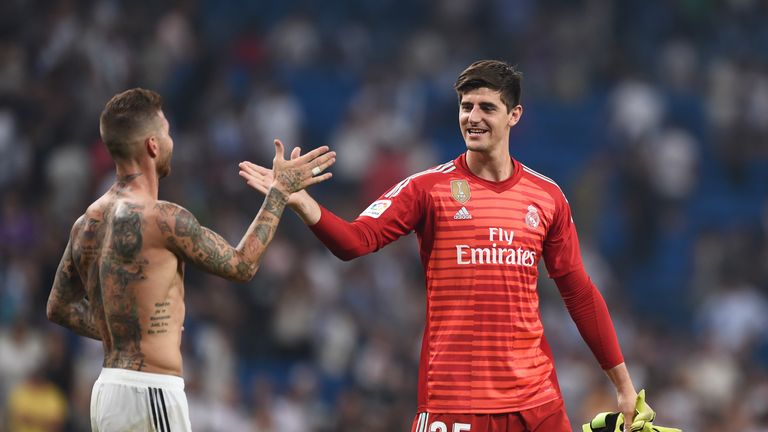 Thibaut Courtois is congratulated by Sergio Ramos after making his Real Madrid against Leganes