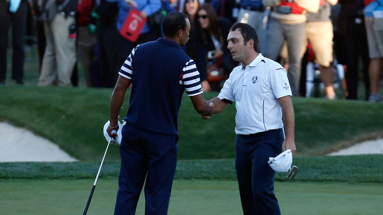 Tiger Woods and Molinari halved their singles match in 2012